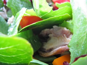 roasted chicken on salad
